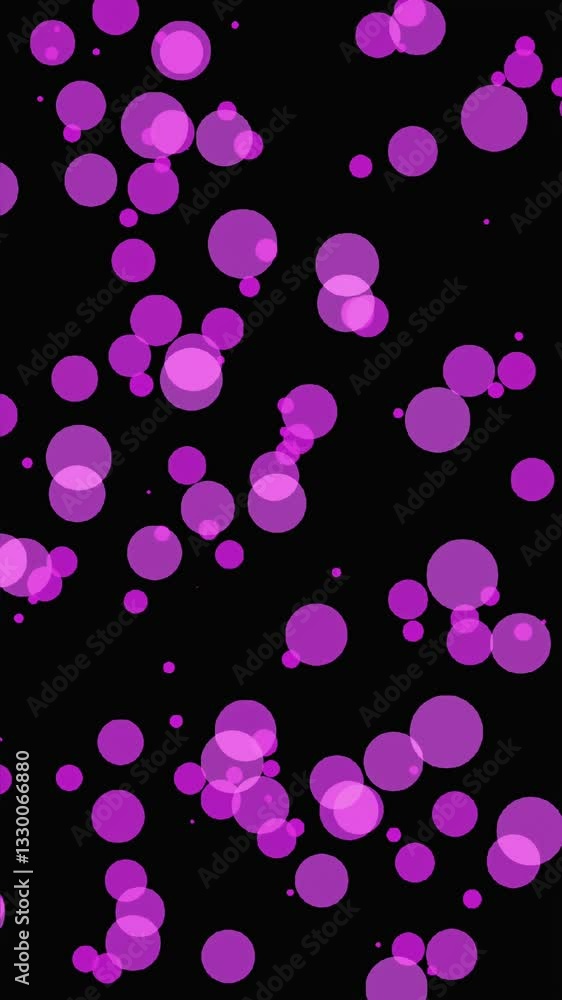 Fototapete Colorful pink circles move dynamically across a dark backdrop in an abstract display of motion and design.  Vertical video. 