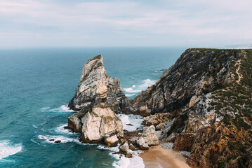 Ursa Beach. Dramatic cliffs meet the Atlantic Ocean at Cape Roca, Portugal, offering stunning coastal scenery.