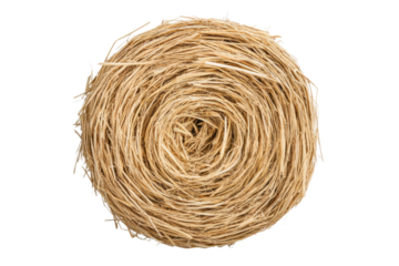Top view of round hay bale in spiral pattern on black background, cut out