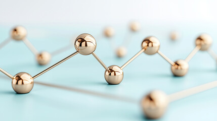 Obraz premium Golden metallic molecules on blue surface for science and technology concepts