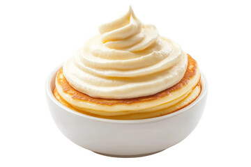 Fluffy pancakes with swirls of creamy vanilla whipped topping in white bowl, cut out