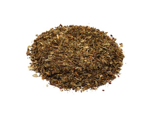 Dried and chopped up basil spice pile isolated on white background