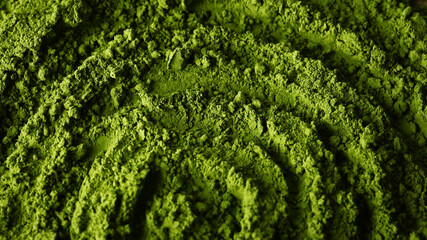 Matcha green tea powder top close up view