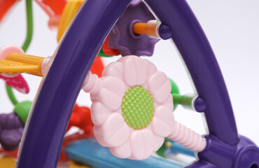 Children's play center for motor skills development on a white background. Toy for a newborn
