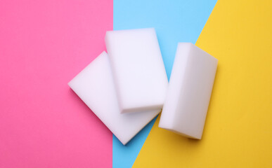 White sponges on a colored background