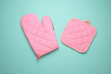 Kitchen glove for baking on blue background