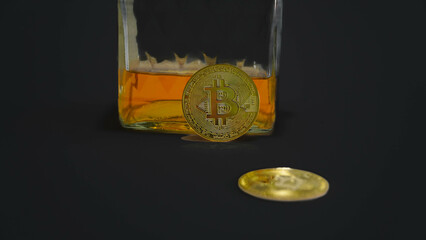 Bitcoin. Golden coins with bitcoin symbol isolated on black background. Digital currency. Block chain. Cryptocurrency