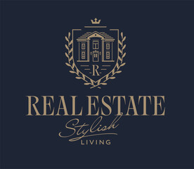 Stylish and Elegant Real Estate Logo Template. Luxury Mansion Icon. Premium Golden Royal Heraldic Shield with Laurel Wreath and Crown. Beautiful House in Engraving Style. 