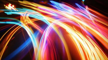 Vibrant Light Trails in Motion Creating Abstract Colorful Patterns