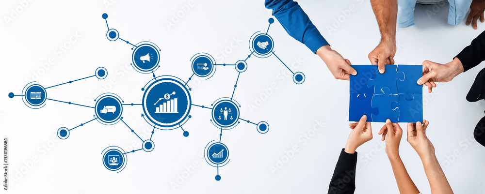 Leinwandbilder Hands gather around a puzzle piece while relevant business icons symbolize teamwork and strategy, highlighting the importance of collaboration for success in a dynamic environment. Amity