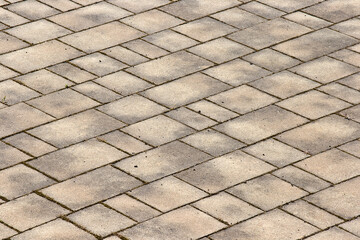 Self-locking concrete pavement designed for use in external applications  featuring permeability to rainwater runoff