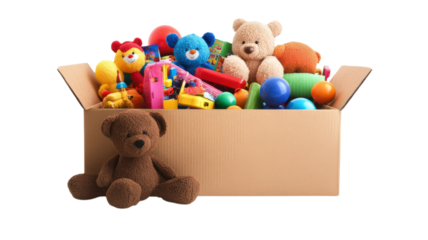 Colorful toys and plush bears arranged in a cardboard box ready for donation