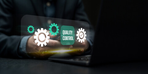 Business professional activating digital quality control automation system with futuristic interface, optimization, and process management for efficiency. Digital quality control and certification.