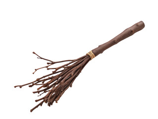 This is a close-up image of a rustic wooden broom made from small twigs.