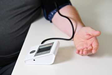 Man measuring blood pressure