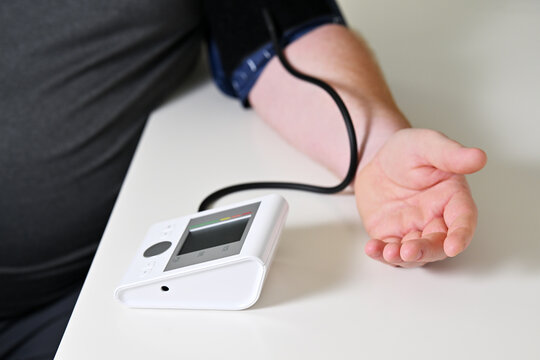 Man measuring blood pressure