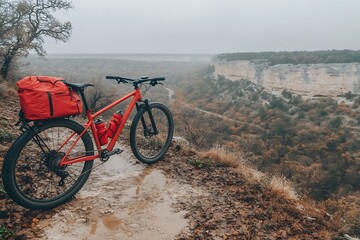 Fototapeta premium Mountain Bike Adventure in Autumn Landscape