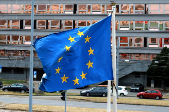 European Union flag of the is blue with yellow stars. The EU flag is waved in the Czech Republic