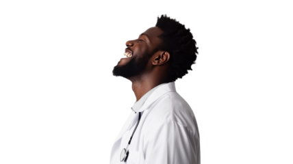 Healthcare professional smiles confidently while wearing a white coat and stethoscope in a bright setting