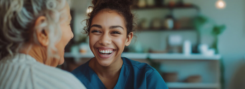 A home health care worker assists an elderly woman in her home / Healthcare aide / Medical assistant
