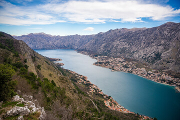 Fototapeta premium Panoramic view of Kotor town and Bay Boca from mountain view point in Montenegro in winter time
