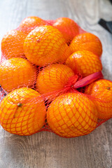 Fresh Oranges Packed in a Net Bag NutrientRich Healthy Fruits for Your Nutrition Needs
