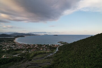 Fototapeta premium Stunning coastal view from a hill overlooking the bay near a small town