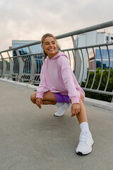 attractive young woman doing sports in the morning