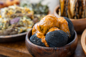 Papas arrugas with mojo picon grilled potatoes with Canarian sauce for appetizer Spain