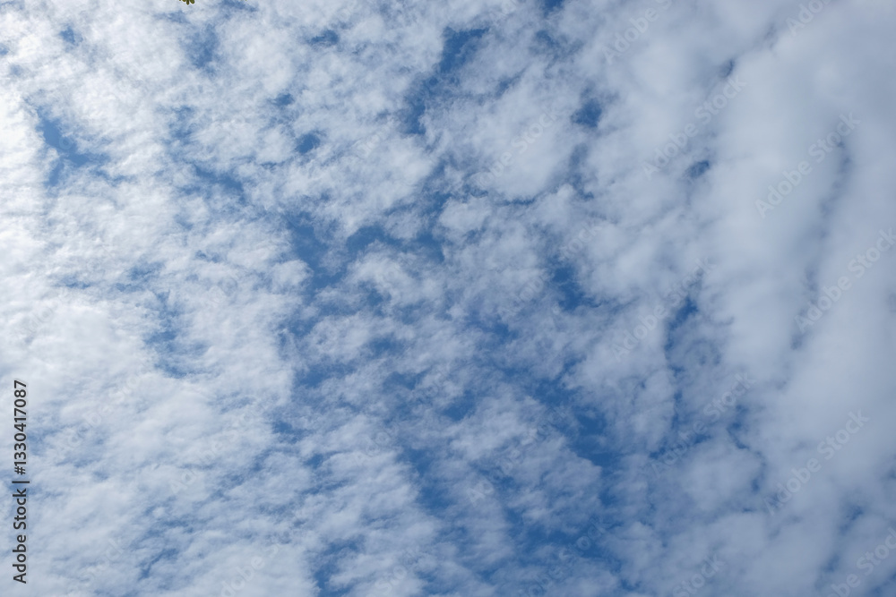Poster pattern and texture background of soft white clouds in the blue sky during the day.climate and weath