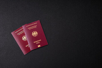 German citizen passport against the black textured background