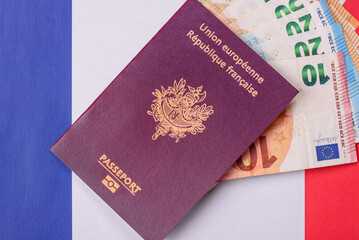 France citizen passport against the background of the France national flag