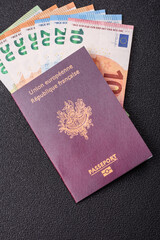France citizen passport against the background of the France national flag