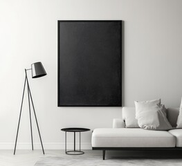 Modern minimalist living room interior with black framed poster, sofa, floor lamp, and side table.