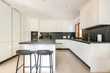 an image of a renovated marble kitchen in luxury mediterranean apartment 