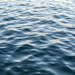 Naklejka premium Close-up of textured, rippling blue water surface. Ocean waves, sea texture, water pattern, natural background.
