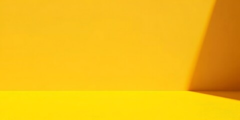 Bright yellow studio backdrop with dynamic lighting and smooth textures