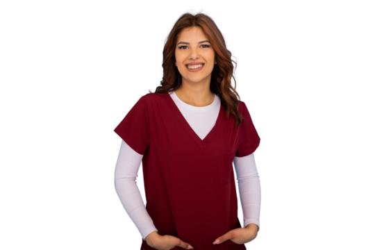 Young female doctor smiling with hands in pockets on transparent background