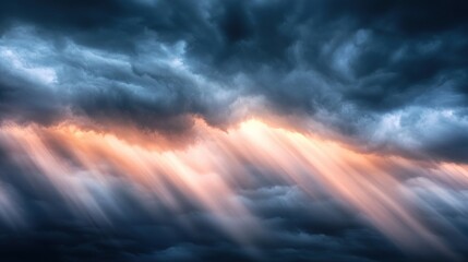 Dark storm layers shifting dramatically into gentle peach and lilac streaks