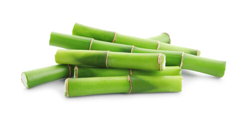 Cut green bamboo stems isolated on white