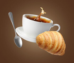 Tasty croissant and freshly brewed coffee. Puff pastry and cup in air on brown background