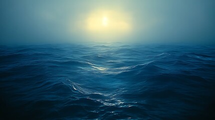 Obraz premium Serene Ocean Waves Under a Misty Sunlit Sky