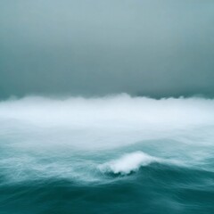 Fototapeta premium Thick sea mist rolling over a violent sea, adding an eerie and mysterious ambiance
