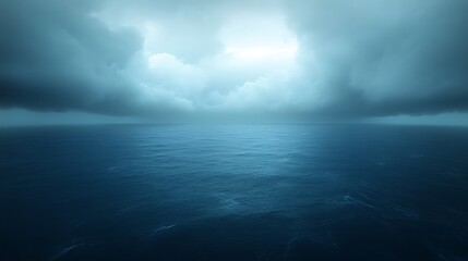 Dark stormy clouds over a deep blue ocean