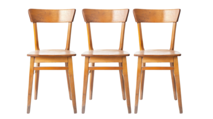 Wooden chairs arranged in a row on a bright background for display or sale in a modern setting