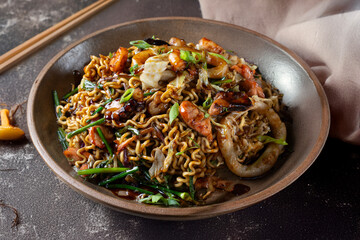 Yakisoba, traditional Asian seafood and vegetable noodles.