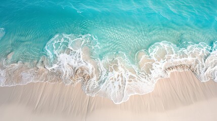 Fototapeta premium An aerial view of a stunning beach with turquoise waves rolling onto golden sands, surrounded by lush coastal landscapes. A serene and dynamic blend of ocean and nature.