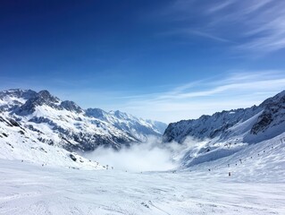Fototapeta premium Breathtaking Snow-Covered Mountain Landscape with Clear Blue Sky and Scenic View of Snowy Slopes and Majestic Peaks in Winter Wonderland