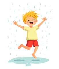 A cheerful boy with bright orange hair joyfully jumps in puddles under the rain, laughing with his arms wide open. He is barefoot, wearing a yellow t-shirt and red shorts, fully enjoying the refreshin
