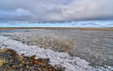 Ice floe breaking apart on a lake during the spring thaw